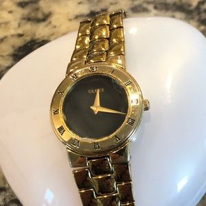 Ladies gold Gucci watch